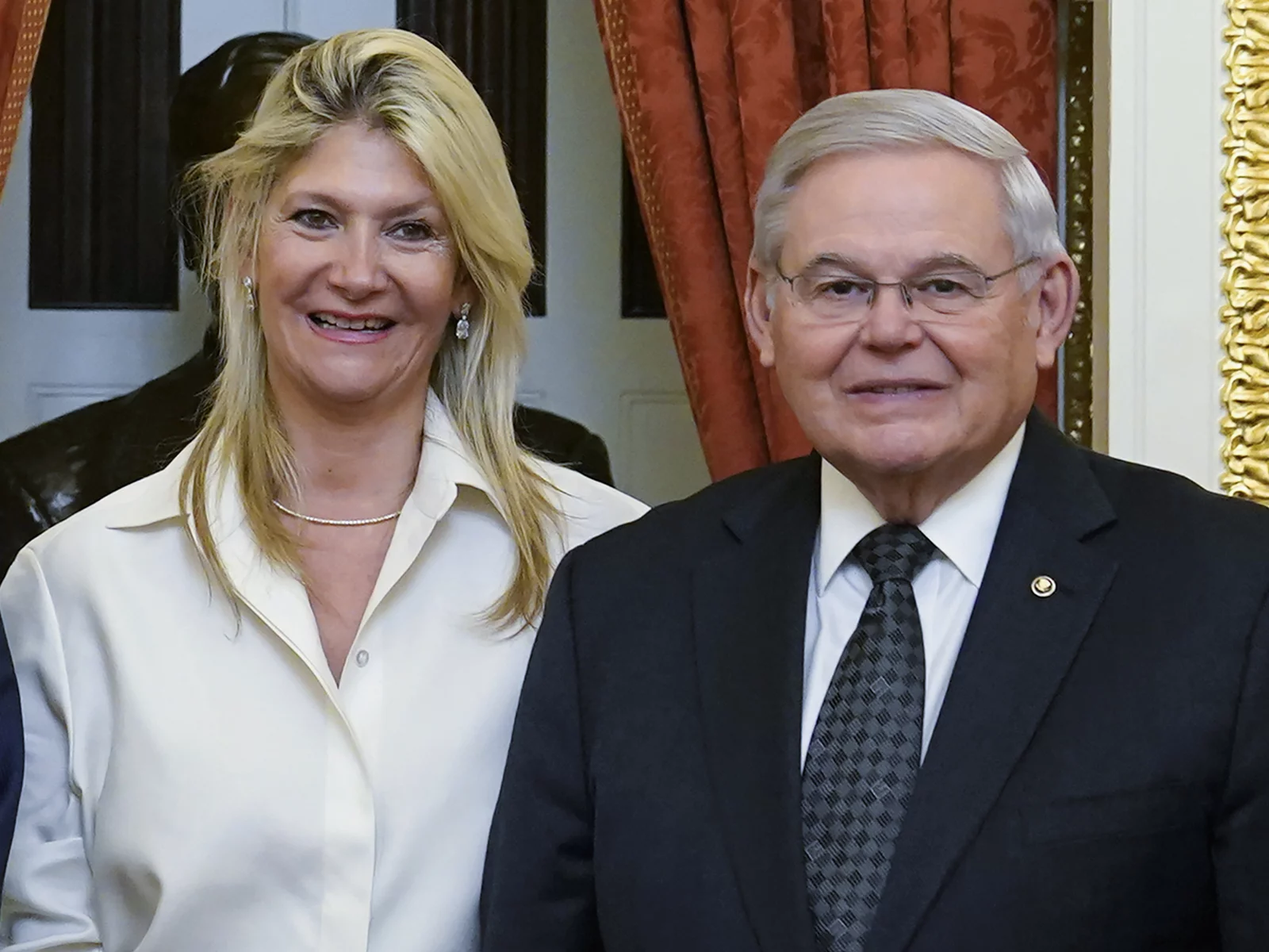 Senate Foreign Relations Committee Chairman Sen. Bob Menendez, D-N.J., and his wife Nadine Arslanian, pose for a photo on Capitol Hill in Washington, Dec. 20, 2022. The couple has been indicted on charges of bribery.