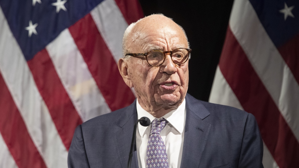 Rupert Murdoch introduces Secretary of State Mike Pompeo during the Herman Kahn Award Gala, in New York, Oct. 30, 2018. (AP Photo/Mary Altaffer, File)