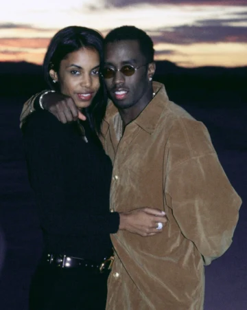 Kim Porter and Sean Diddy Combs in Apple Valley, California