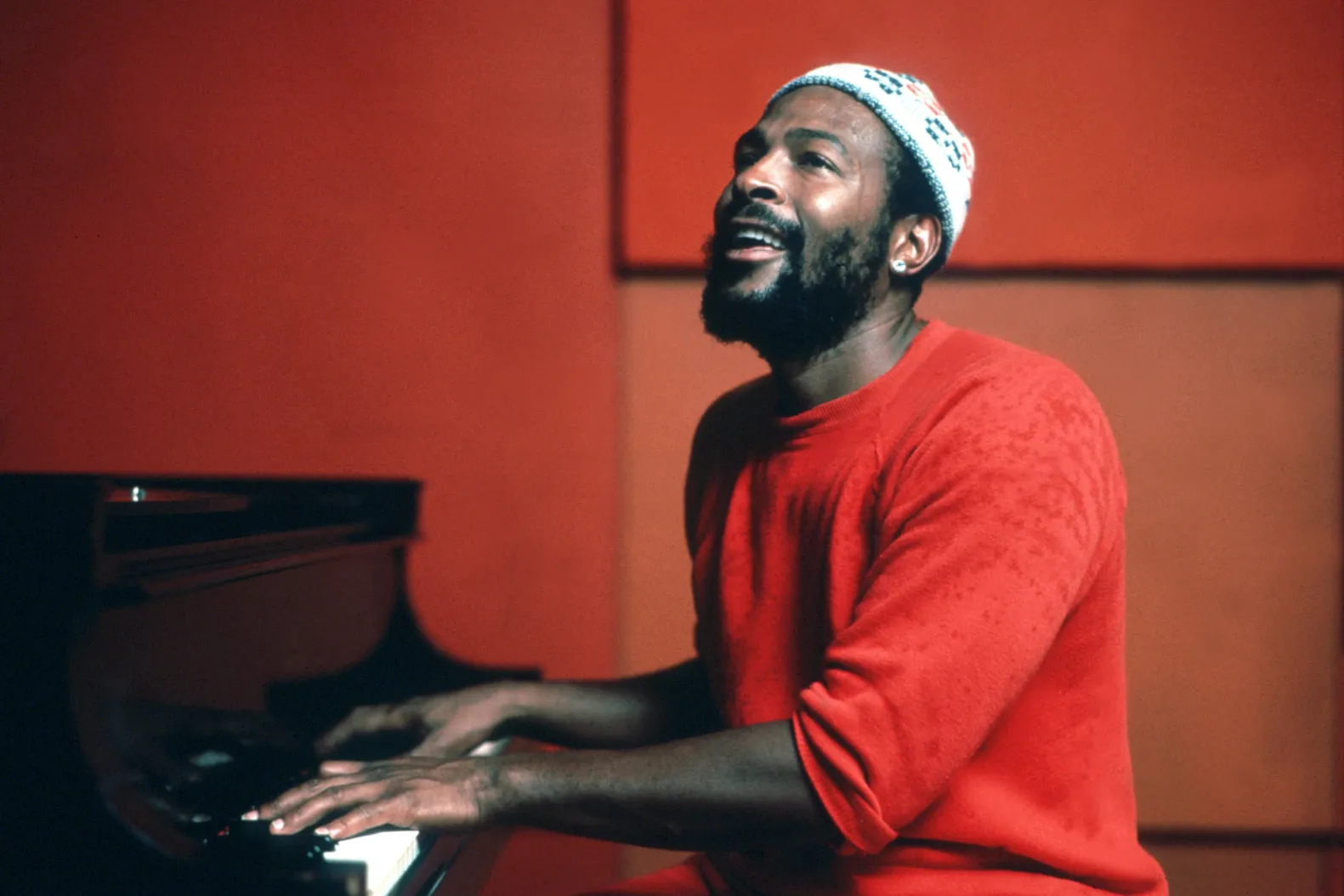 Soul singer Marvin Gaye plays piano as he records in a studio