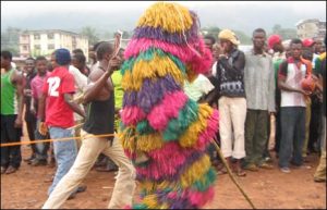 Outrage As Masquerade Attack Female Nurse In Nsukka (VIDEO)