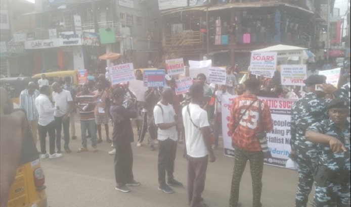 Tight Security As Protesters Chant 'Let The Poor Breathe' In Lagos - [Photos]