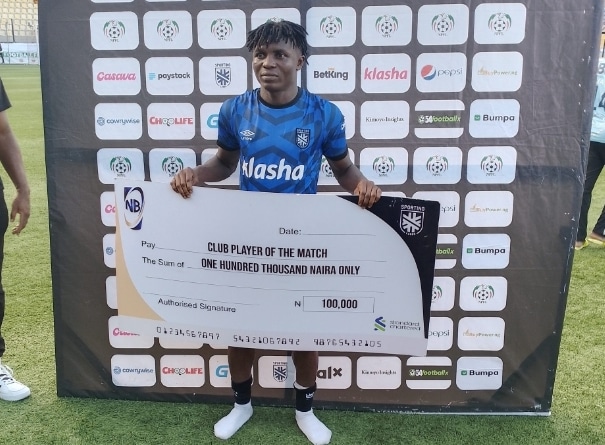 Sporting Lagos Godwin Odibo with the man of the match prize. 