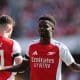 Bukayo Saka celebrates after scoring for Arsenal in their Premier League opener.