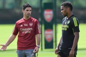 Jurrien Timber and Mikel Arteta