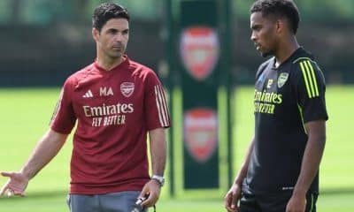 Jurrien Timber and Mikel Arteta