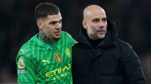 Pep Guardiola and Ederson