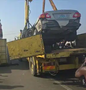 Driver Escapes Death As Container Crushes Car In Mile 2, Lagos